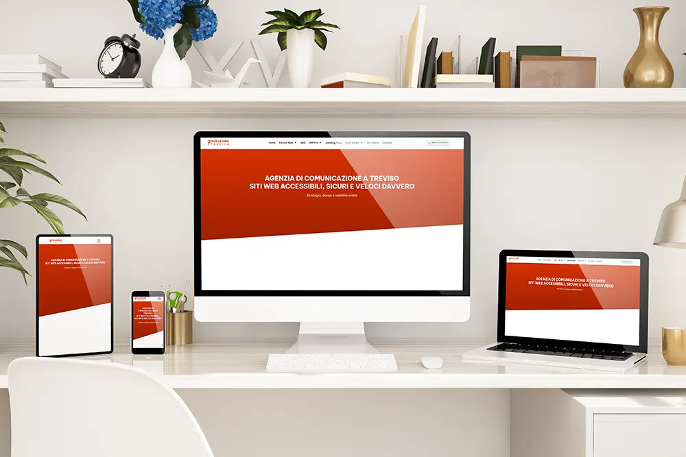 Sito web responsive per agenzia di comunicazione, visualizzato su desktop, laptop, tablet e smartphone